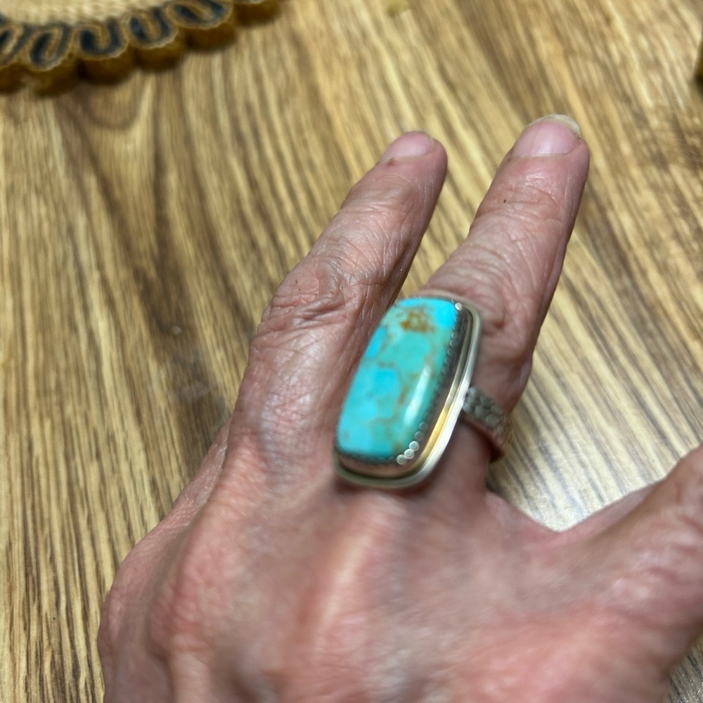Ladies Turquoise Ring size 6 with veins running through out